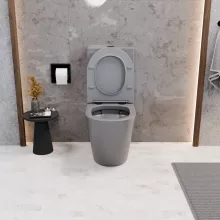 HD Dream Matt Grey perem nélküli mély öblítésű íves monoblokkos WC alsó kifolyású slim "P" tetővel és matt fekete nyomógombbal + tartály