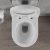 HD Madrid Glossy White perem nélküli mély öblítésű íves fali WC compact "A" tetővel és fényes króm zsanérral