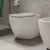   HD Lea Glossy White perem nélküli mély öblítésű íves álló WC slim "L" tetővel és fényes króm zsanérral
