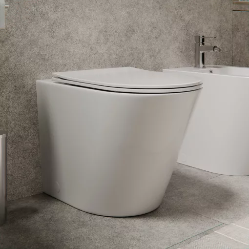 HD Madrid Glossy White perem nélküli mély öblítésű íves álló WC slim "L" tetővel és fényes króm zsanérral